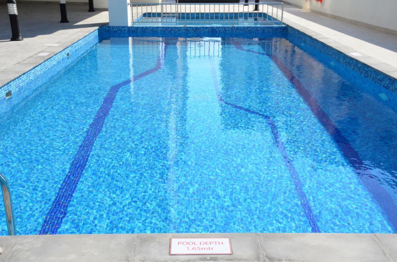 The Lodge Suites Manama Exterior foto